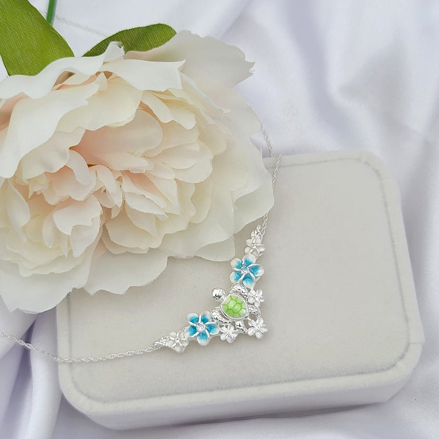Sterling Silver Plumeria Sea Turtle Necklace